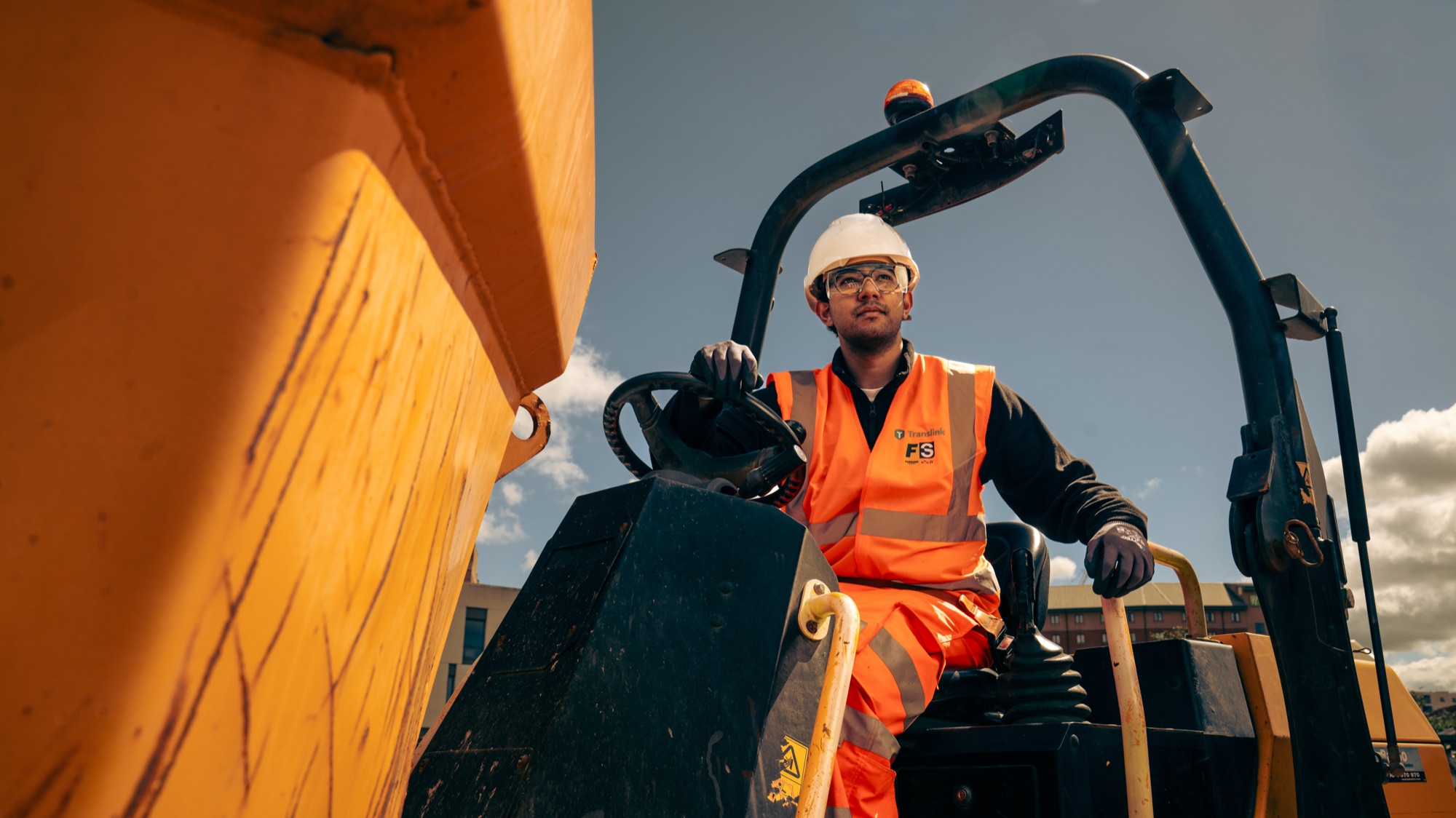 An operative working on a live construction site